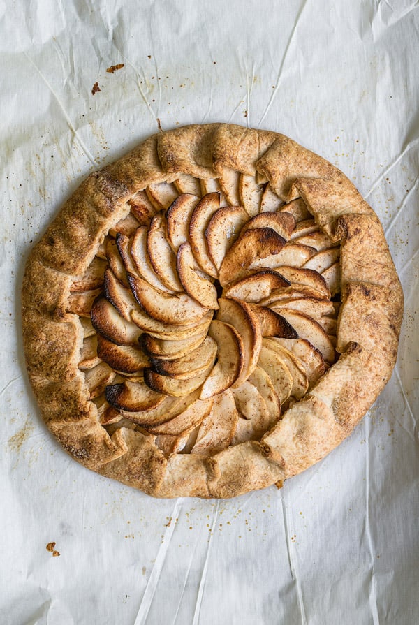 This salted caramel apple galette is a healthy low-sugar vegan option for a Fall dessert! Made with apples, and dates, you'll be sure to love this galette!