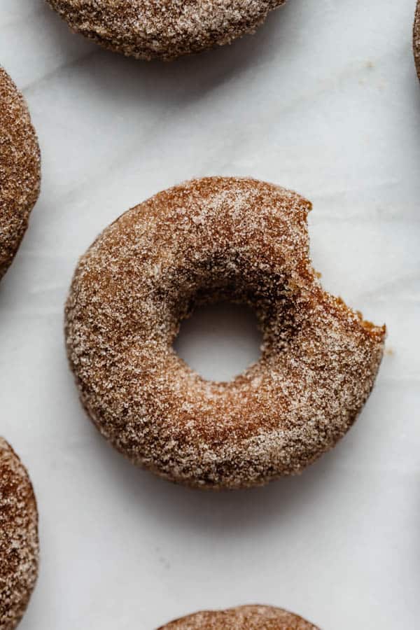 vegan gingerbread donuts with gingerbread sugar