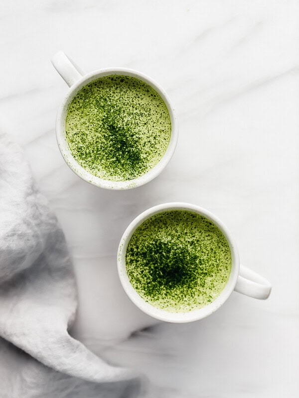 two cups of matcha tea latte