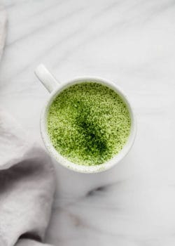 mugs filled with a matcha tea latte
