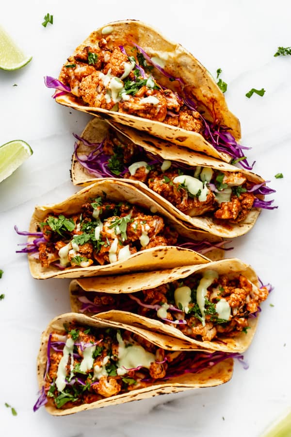 five cauliflower tinga tacos