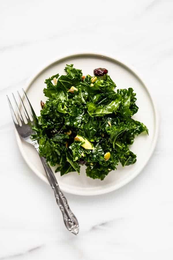 massaged kale salad recipe on a plate