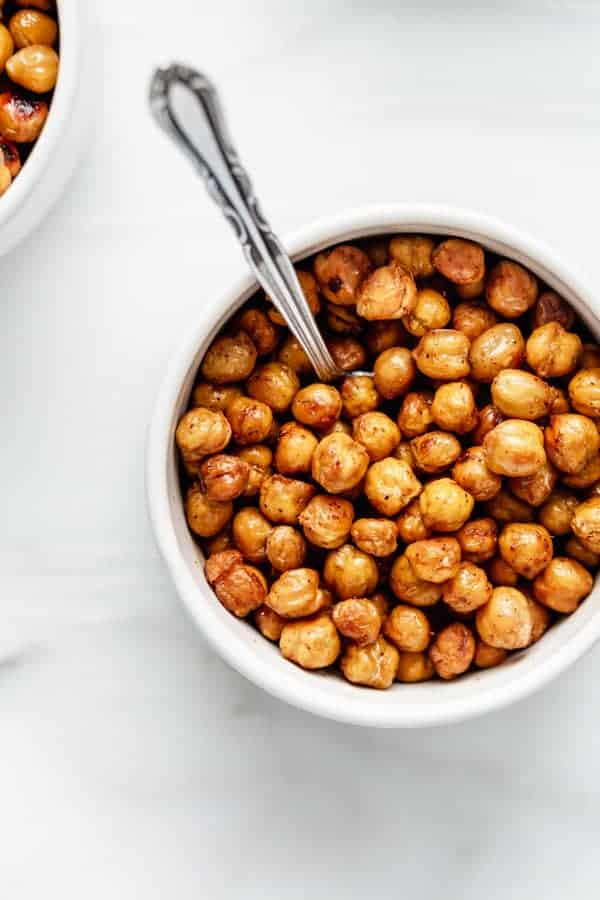 roasted chickpeas in a bowl with a spoon