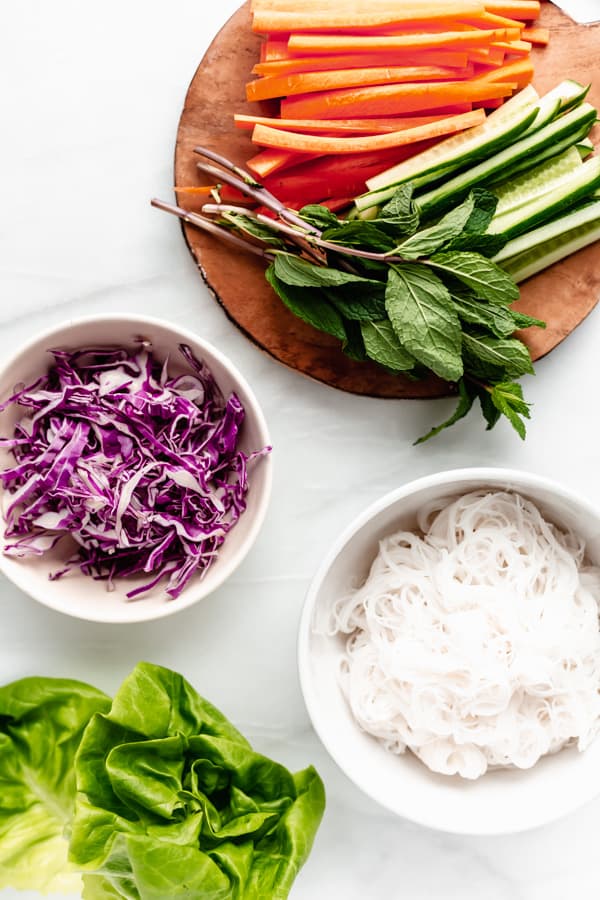 A flat lay of ingredients for fresh spring rolls