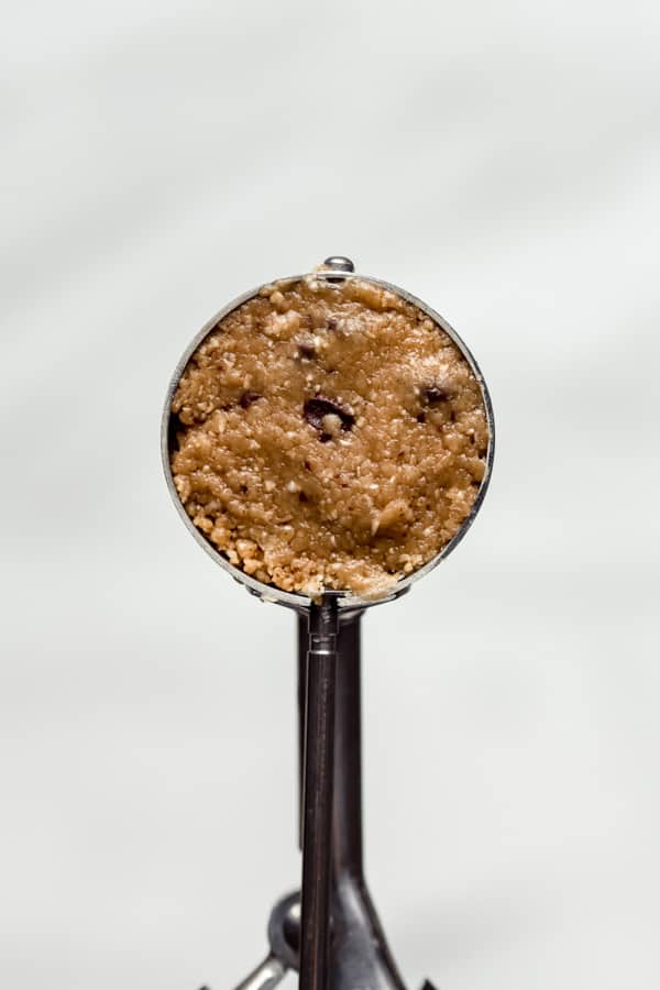 peanut butter oatmeal cookie dough in a cookie scoop
