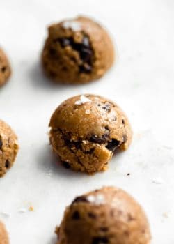 close up of peanut butter oatmeal cookie on a marble board