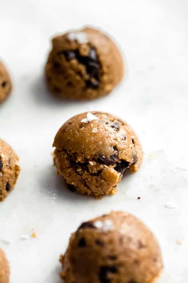 close up of peanut butter oatmeal cookie on a marble board