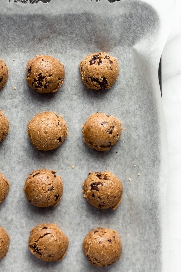 no bake peanut butter oatmeal cookies on a pan with parchment paper