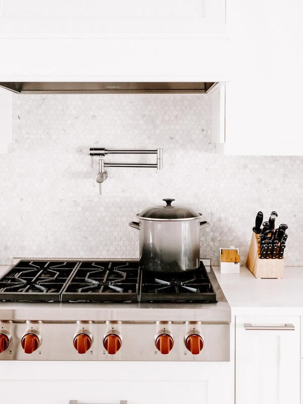 a kitche stove with a pot on it