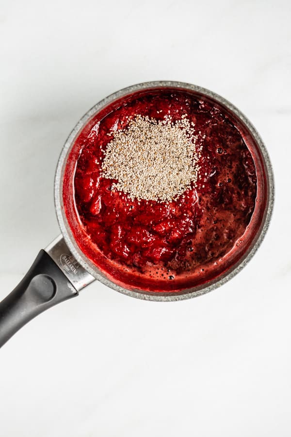 a pot with strawberries and chia seeds