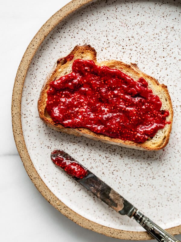 a piece of toast with chia seed jam on it