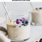 a cup of overnight steel cut oats topped with blueberries