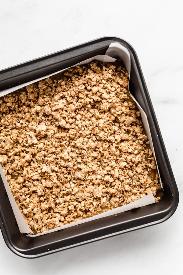 unbaked apple pie bars in an 8x8 inch pan