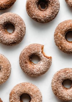 vegan apple cider donuts on a marble board
