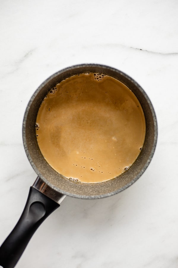a grey pot with vegan caramel in it