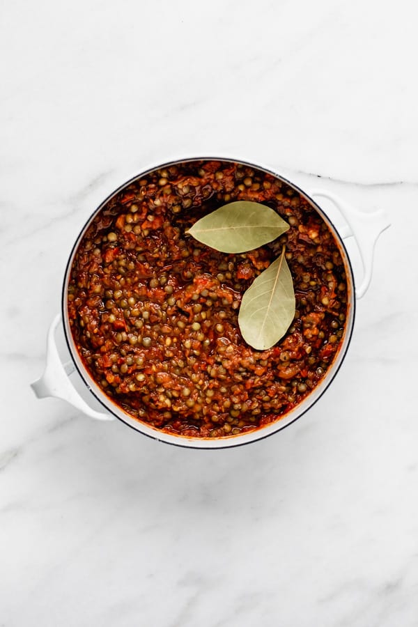 lentil bolognese sauce in a white pot