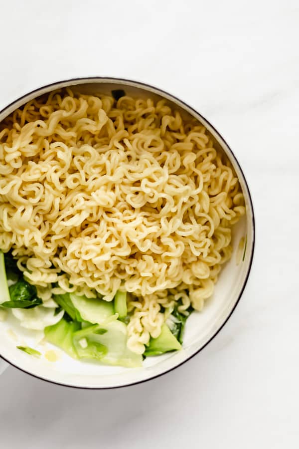 Ramen noodles in a white pot