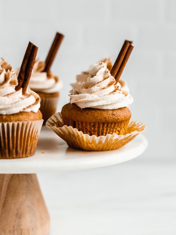 pumpkin spice latte cupcakes on a marble cake stand