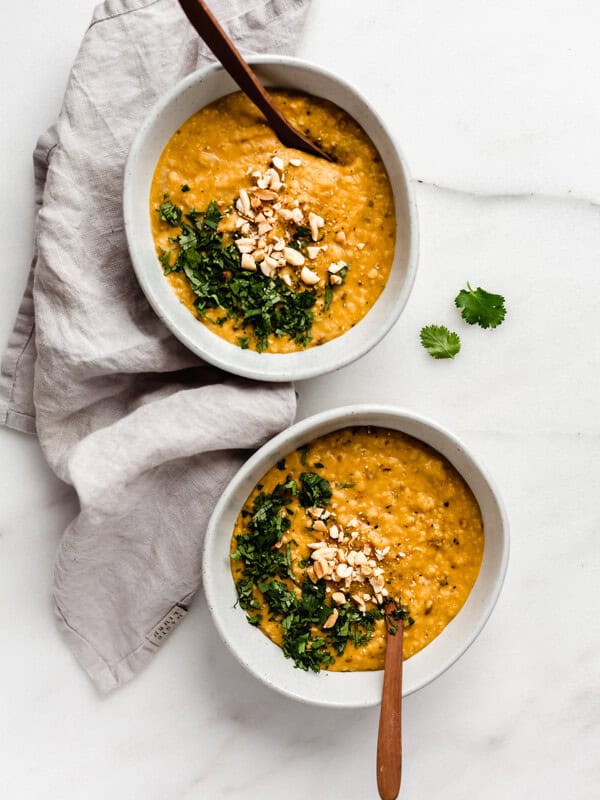 two bowls of Sri Lankan style dal with a napkin on the side