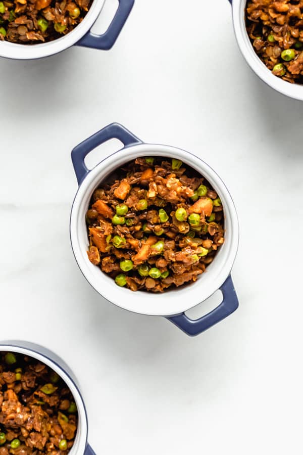 lentils and veggies in small blue ramekins