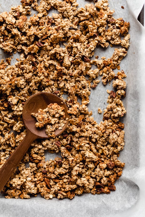banana bread granola on a baking sheet