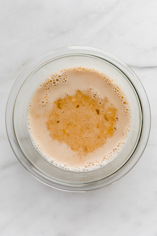 wet ingredients in a clear bowl for oatmeal cups