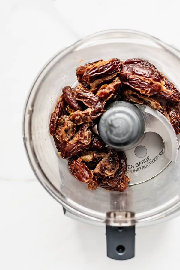 a food processor with dates in it