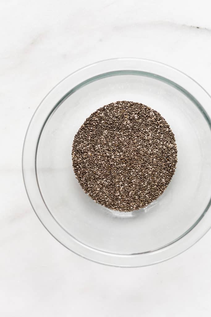 chia seeds in a clear mixing bowl
