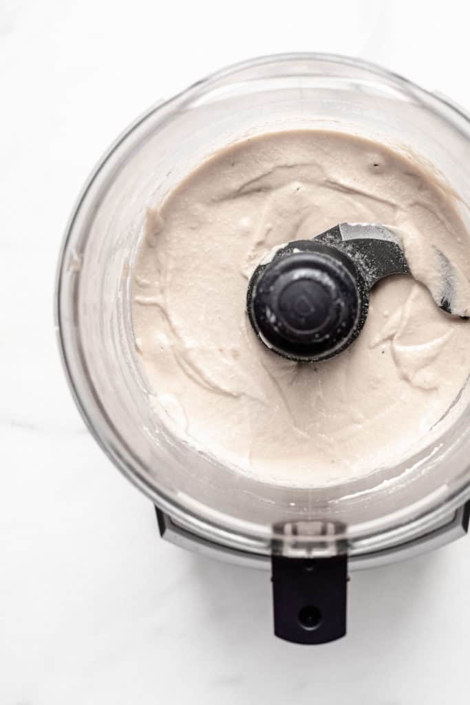 raw cashew cream in a food processor