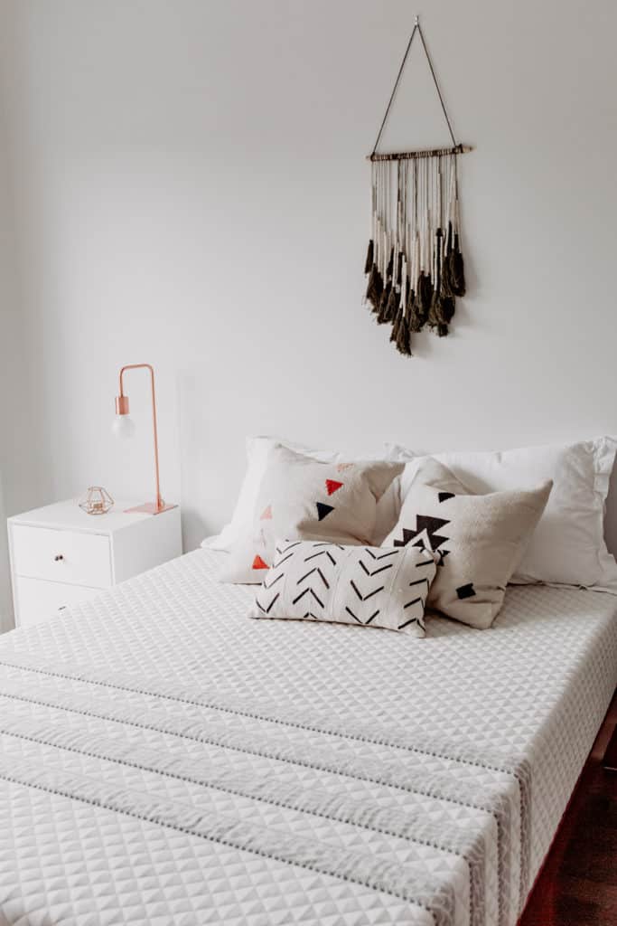 A leesa mattress with pillows on it