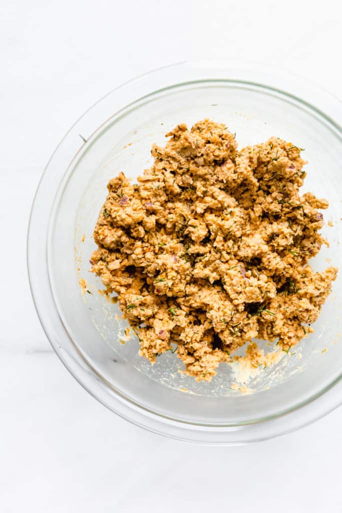 a bowl of smashed chickpea salad