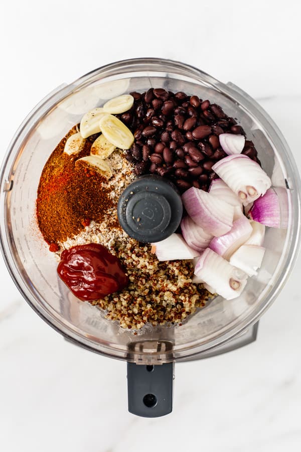 black beans, quinoa, spices, onions and garlic in a food processor