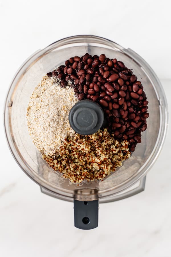 black beans, quinoa and ground oats in a food processor