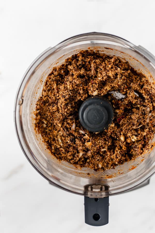 ground black beans and quinoa in a food processor