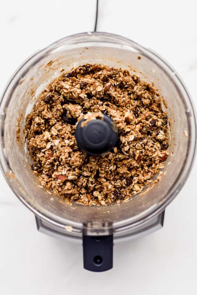a food processor with energy ball mix in it