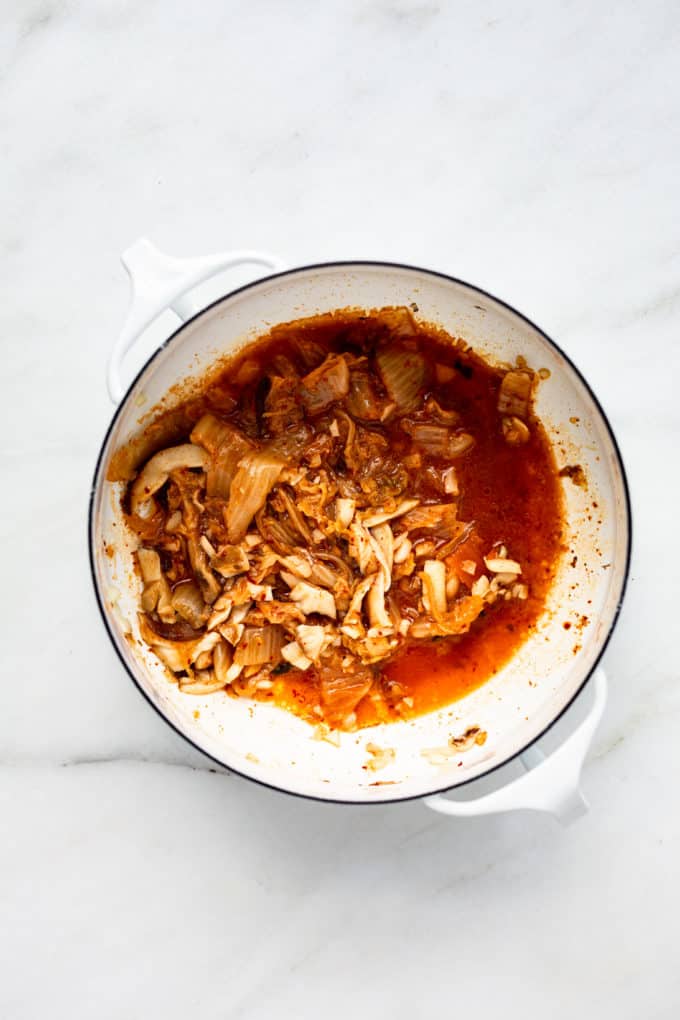 a white pot with kimchi in it