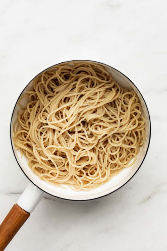brown rice spaghetti noodles in a white pot