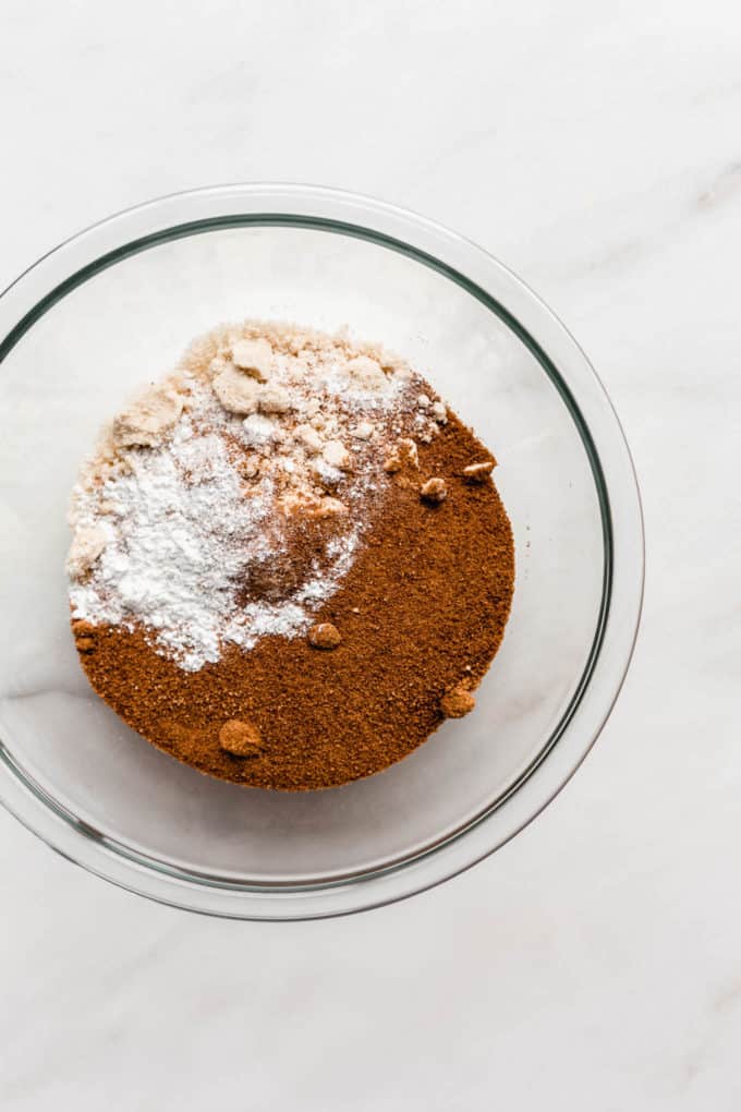 Coconut sugar and almond flour in a clear mixing bowl