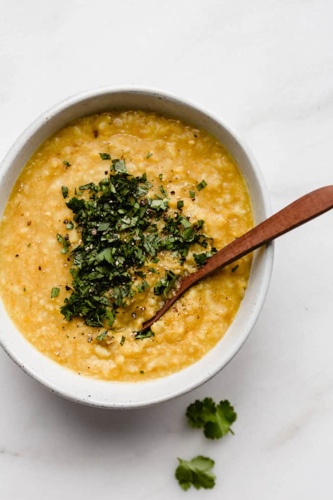 a close up of a bowl of aryuvedic khichdi