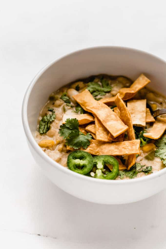 white vegan chili in a while bowl