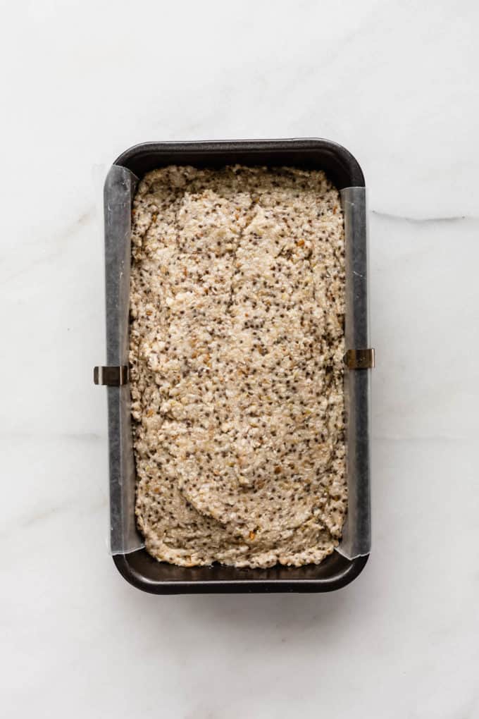 raw buckwheat chia bread in a loaf pan