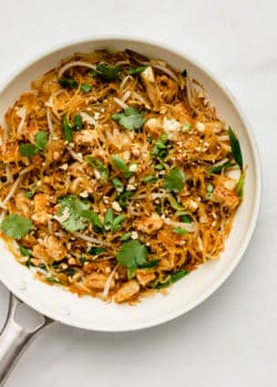 Spaghetti squash and vegetables in a white pan