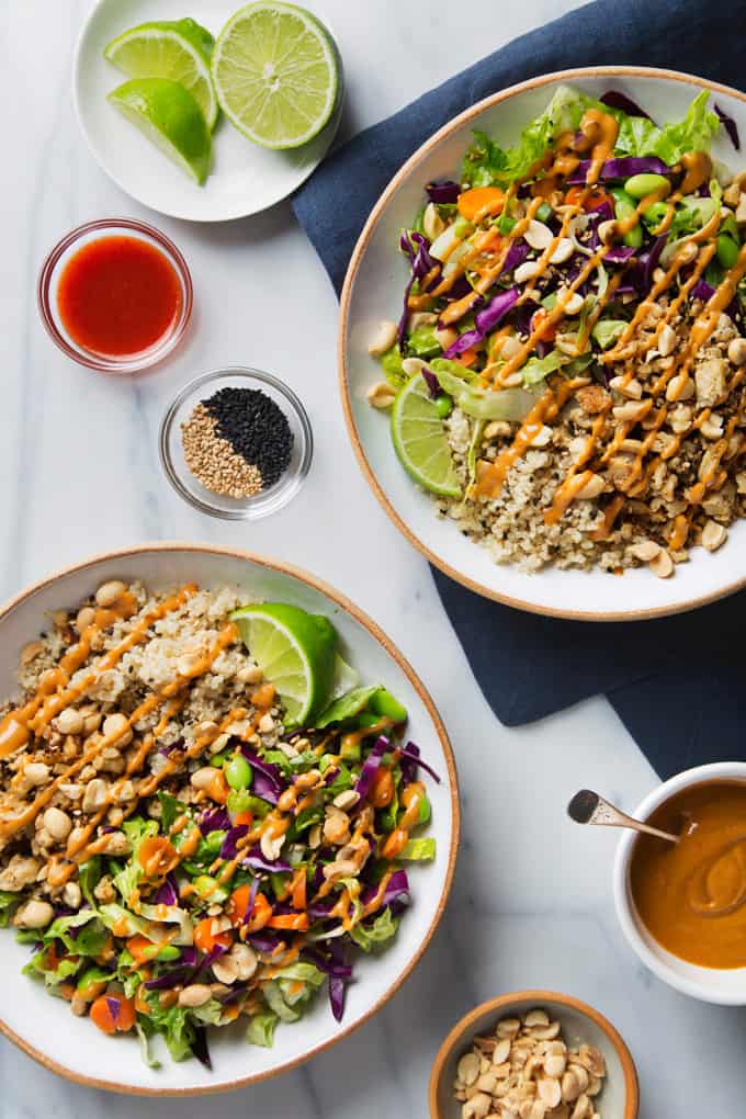 Two buddha bowl with quinoa, salad and tempeh