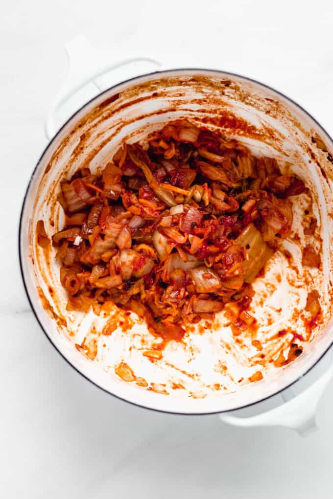 A white pot with kimchi in it
