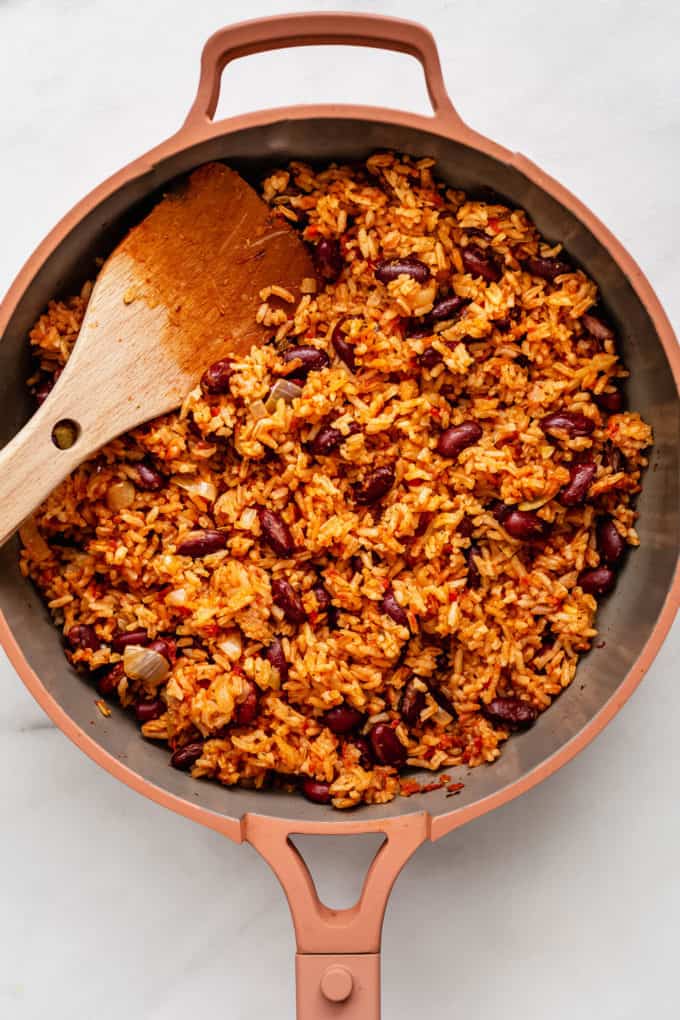 rice and beans in a pink pan