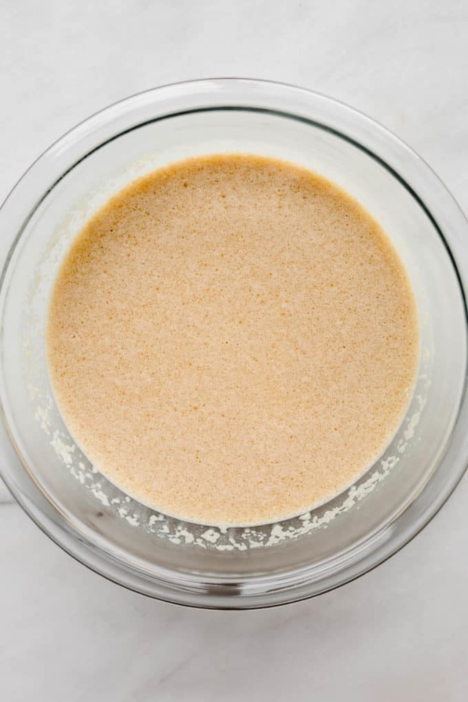 A bowl of almond milk and eggs mixed together