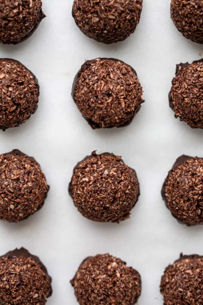 chocolate coconut macaroons on a marble board