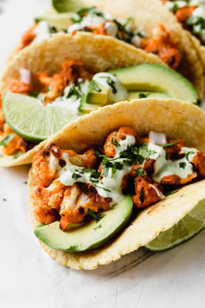 a taco stuffed with buffalo cauliflower