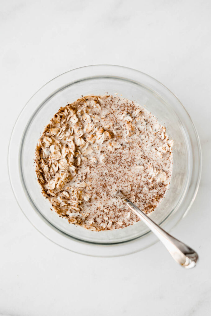 oats and almond milk in a mixing bowl