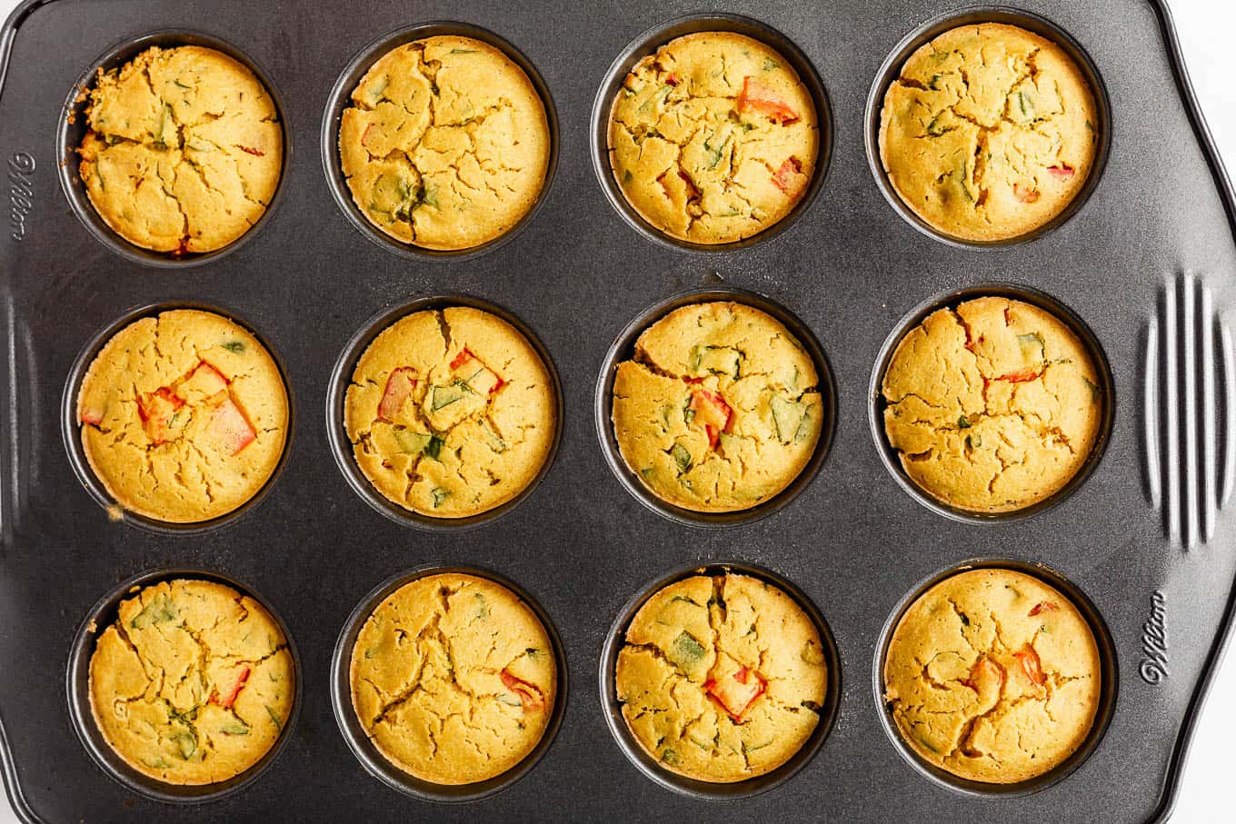 a baking pan with baked mini chickpea flour quiche